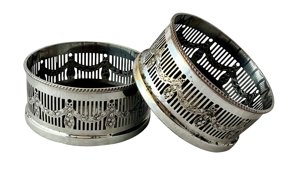 Pair of elegant 20th Century English silver plate wine coasters in the neoclassical style