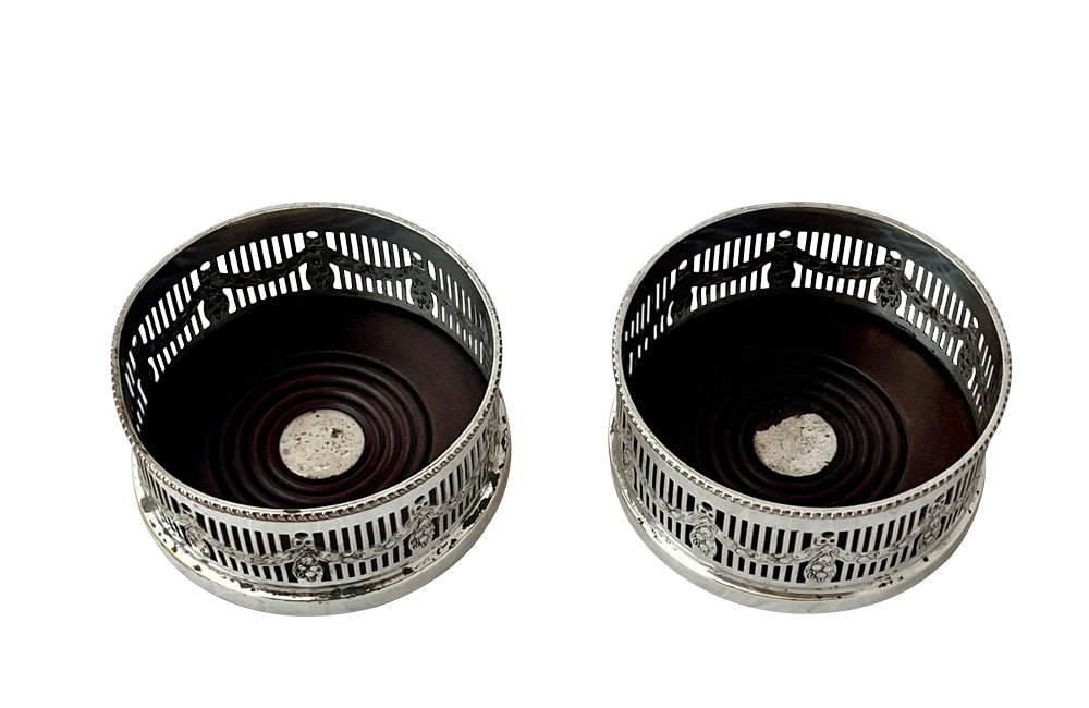 Pair of elegant 20th Century English silver plate wine coasters in the neoclassical style