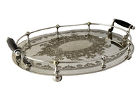 Elegant, silver plate tray with raised gallery and ebony handles engraved with floral and foliate decoration and empty central cartouche bearing the makers mark of Mackay Bros, Dundee.