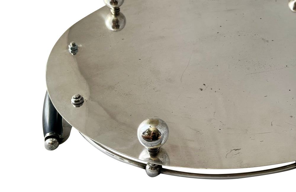 Elegant, silver plate tray with raised gallery and ebony handles engraved with floral and foliate decoration and empty central cartouche bearing the makers mark of Mackay Bros, Dundee.