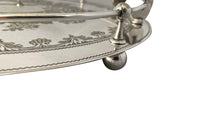 Elegant, silver plate tray with raised gallery and ebony handles engraved with floral and foliate decoration and empty central cartouche bearing the makers mark of Mackay Bros, Dundee.
