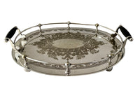 Elegant, silver plate tray with raised gallery and ebony handles engraved with floral and foliate decoration and empty central cartouche bearing the makers mark of Mackay Bros, Dundee.