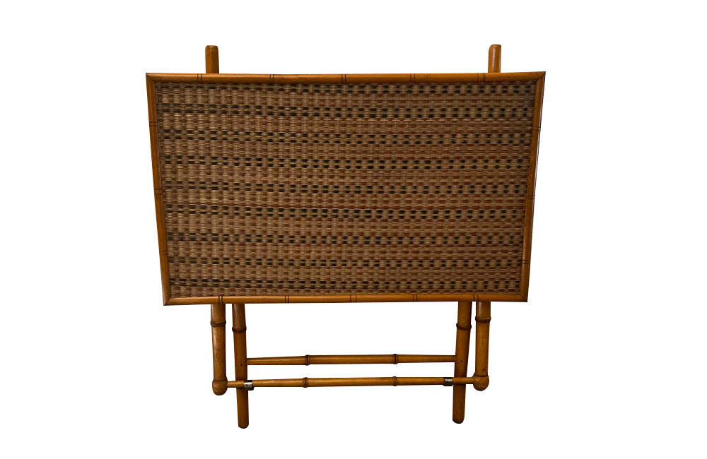 Folding faux bamboo table with coloured rattan top.