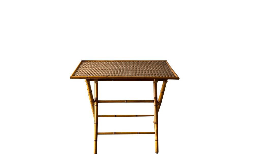Folding faux bamboo table with coloured rattan top.