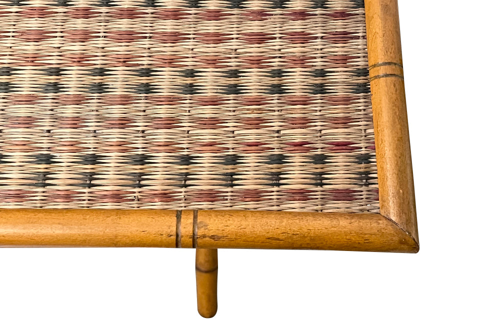 Folding faux bamboo table with coloured rattan top.