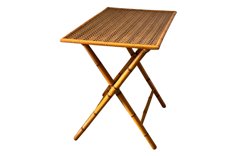 Folding faux bamboo table with coloured rattan top.