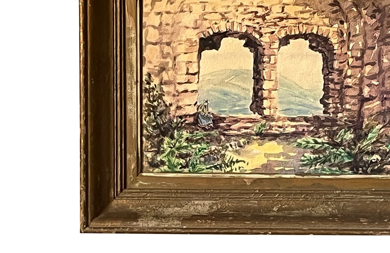 Early 20th Century French watercolour of a woman seated in the arch of ruin walls around Carcassonne.   Signed Chauvette.