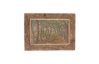 Oil on card painting of a shady forest path with pink blossoming trees signed by the artist to the lower right, Cohen
