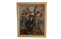 Large Mid-Century French framed oil on canvas still life painting depicting a large blue jug filled with colourful flowers on a table.