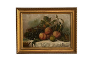 20th Century French framed still life painting of peaches and grapes on a draped fringed table cloth.