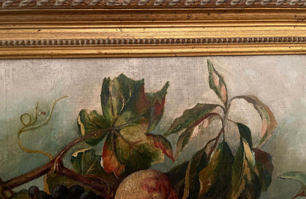 20th Century French framed still life painting of peaches and grapes on a draped fringed table cloth.