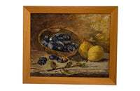 Lovely French still life painting of a basket of plums with two pears and a leafed twig
signed to the lower right by the artist H Trudelle 1983