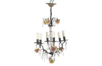 20th Century chandelier with bunches of coloured glass grape drops and brass vine leaves.