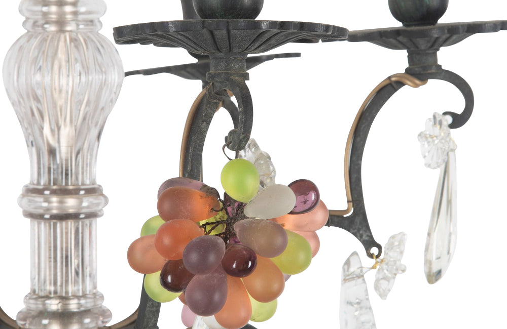 20th Century chandelier with bunches of coloured glass grape drops and brass vine leaves.