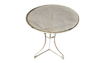 French iron garden table with pierced round top on tripod base with circular stretcher circa 1900