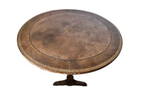 French,19th century, vineyard table with nicely worn embossed leather top .