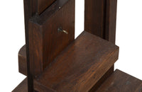 Early 20th Century French oak artist's easel bearing the brass label 'L. Berville Paris 25 Chausee d'Antin'.