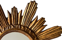 Mid 20th Century decorative Spanish giltwood sunburst mirror with rays. 