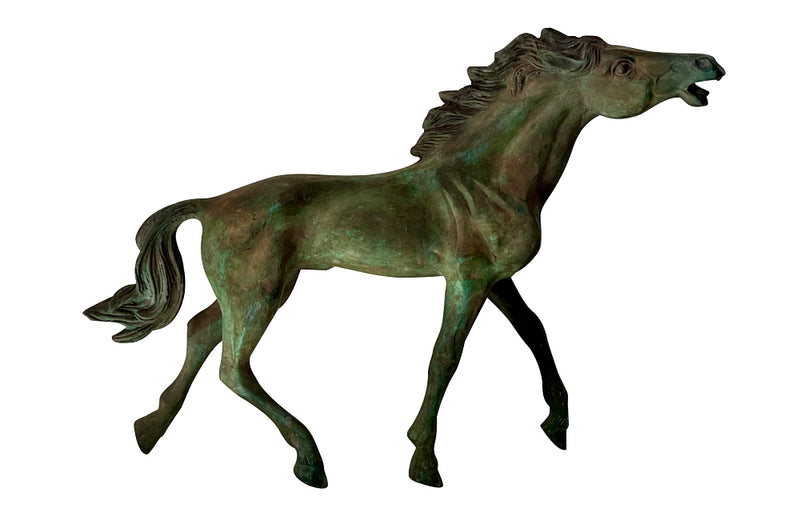Decorative mid-20th Century French brass horse statue in a patinated bronze finish.