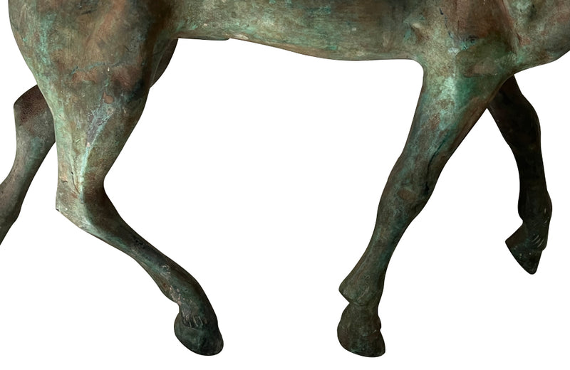 Small decorative mid-20th Century French brass horse statue in a patinated bronze finish.