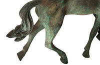 Small decorative mid-20th Century French brass horse statue in a patinated bronze finish.