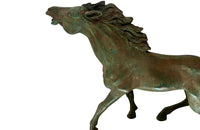 Decorative mid-20th Century French brass horse statue in a patinated bronze finish.