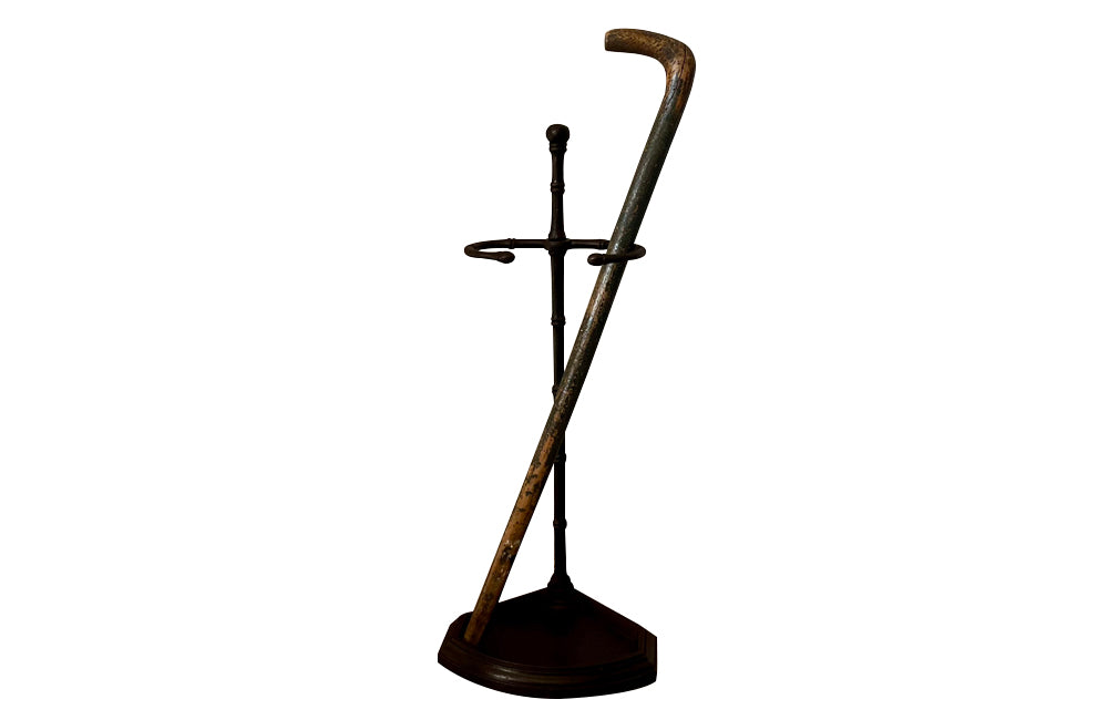 Elegantly simple late 19th Century French iron faux bamboo umbrella or stick stand.