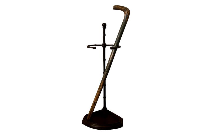 Elegantly simple late 19th Century French iron faux bamboo umbrella or stick stand.