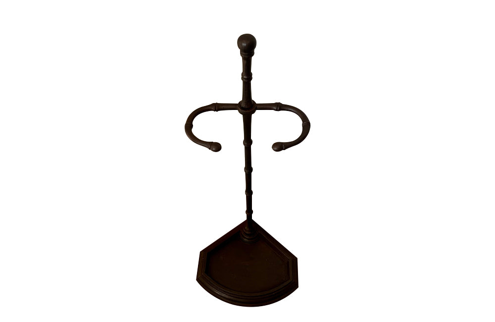 Elegantly simple late 19th Century French iron faux bamboo umbrella or stick stand.