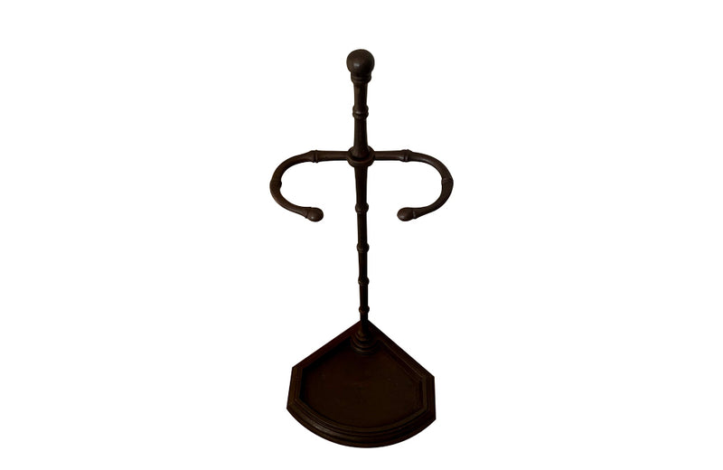 Elegantly simple late 19th Century French iron faux bamboo umbrella or stick stand.