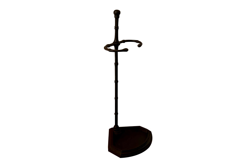 Elegantly simple late 19th Century French iron faux bamboo umbrella or stick stand.