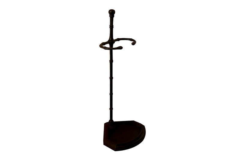 Elegantly simple late 19th Century French iron faux bamboo umbrella or stick stand.