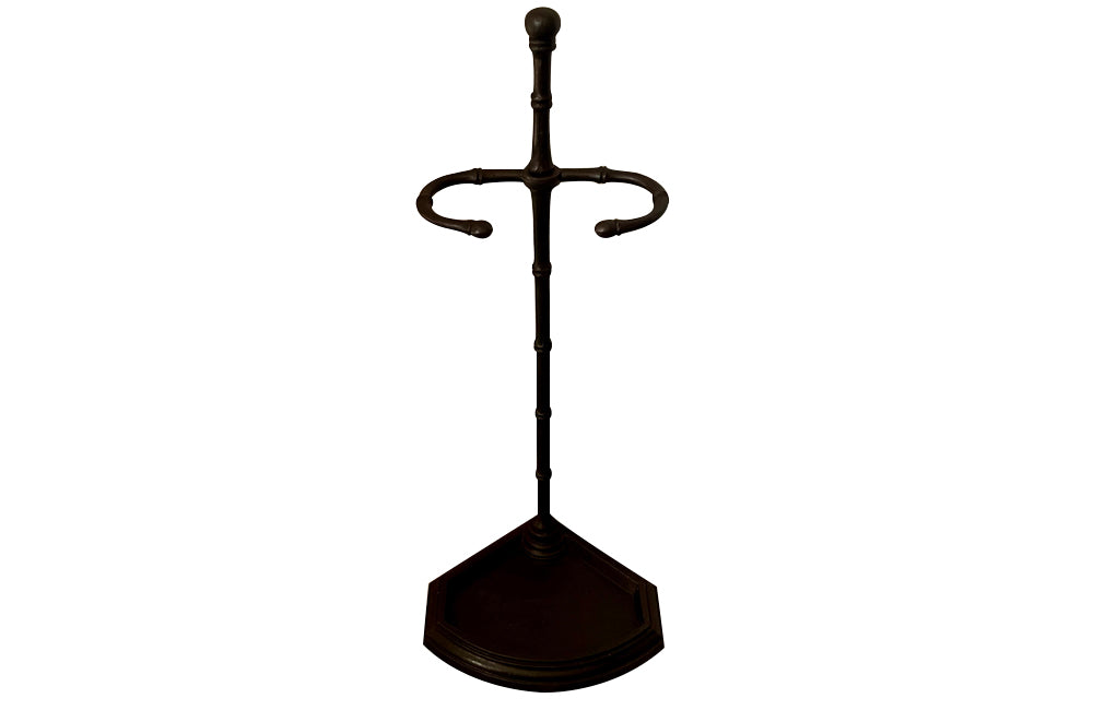 Elegantly simple late 19th Century French iron faux bamboo umbrella or stick stand.