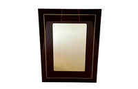 1970s mirror with burgundy acrylic frame and brass banding. Italian
