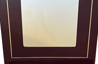 1970s mirror with burgundy acrylic frame and brass banding. Italian