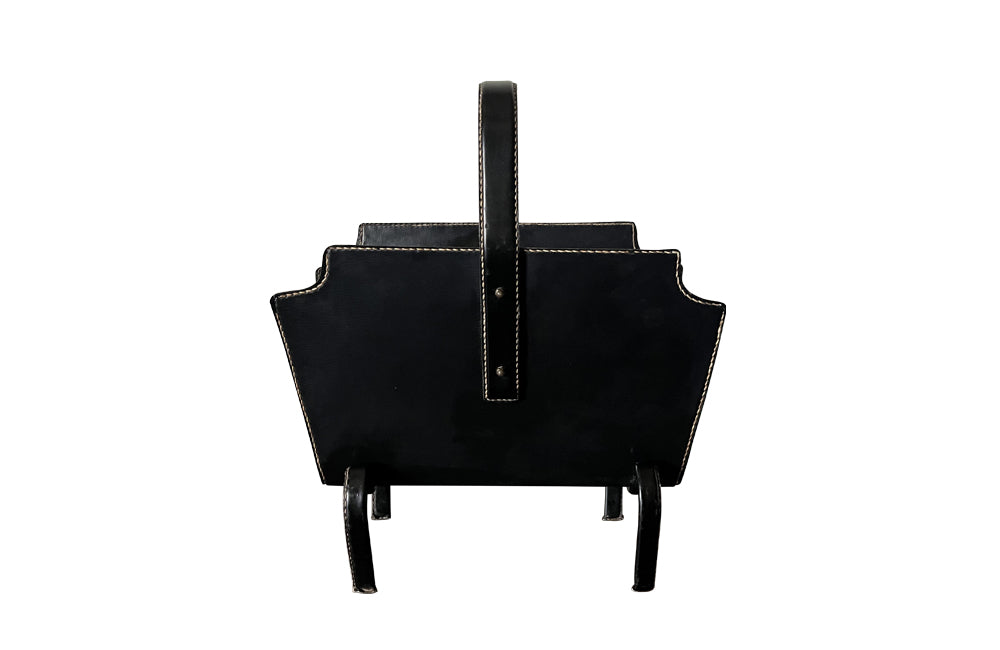 20th century stitched black leather with brass studs magazine holder by Jacques Adnet.