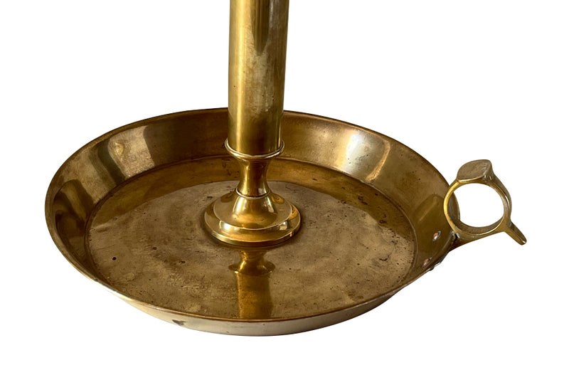 Large brass candle holder in the form of a French 'Rat de Cave' or cellar candlestickw ith adjustable height