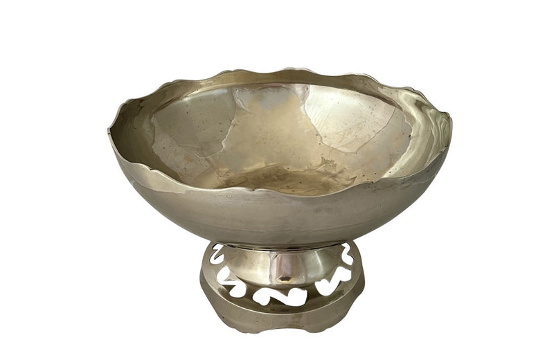 Large French silver plate champagne cooler vasque with the rim and foot shaped and the base decorated with cut out shapes.