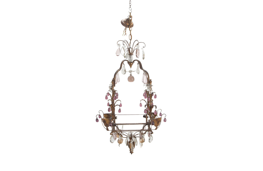 Beautiful early 20th century large gilt metal cage chandelier with clear and coloured glass drops, foliate embellishments and draped tassle motifs.