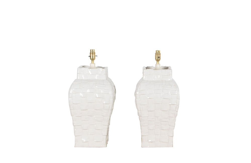 Large pair of white French ceramic basket weave design table lamps. 