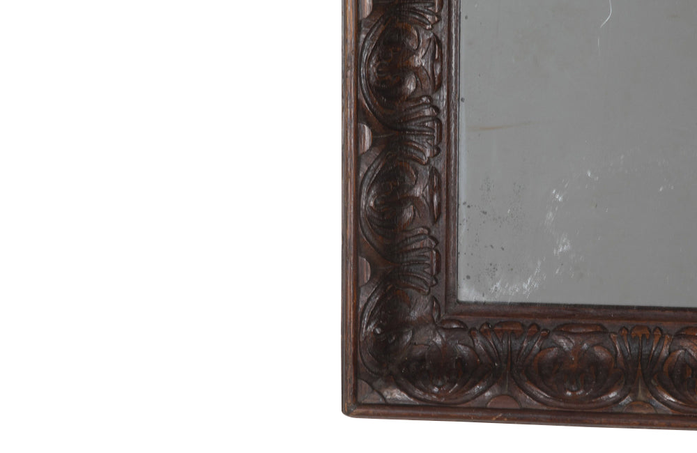 Large 19th Century French oak mirror with a beautifully deep carved oak acanthus motif frame.