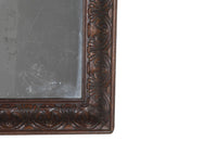 Large 19th Century French oak mirror with a beautifully deep carved oak acanthus motif frame.