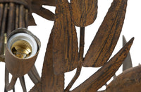 Large Mid-Century Spanish foliate ceiling light with eight branched bulb holders.