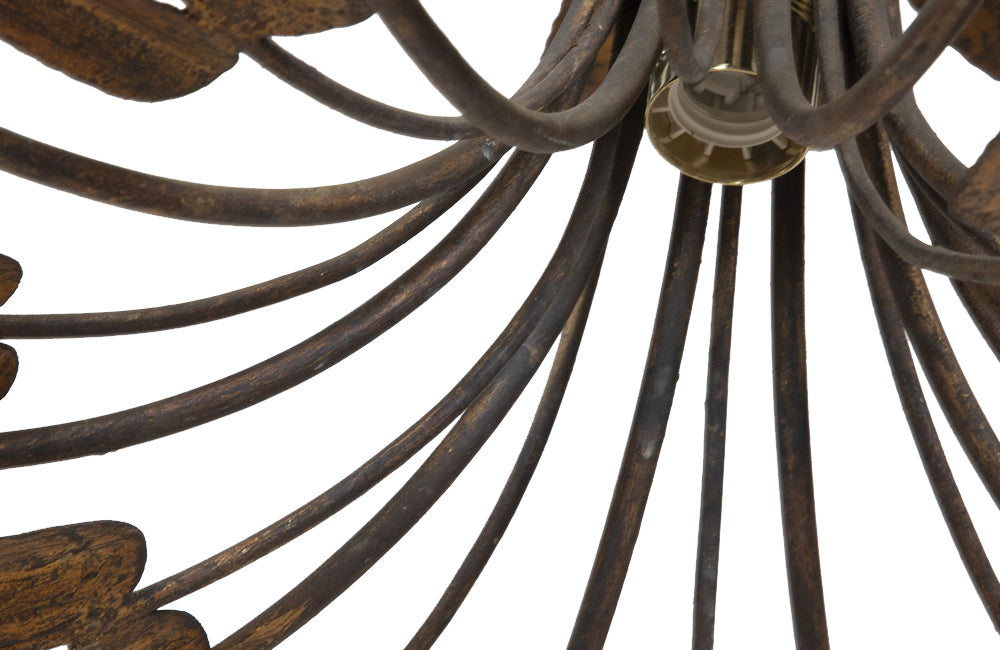 Large Mid-Century Spanish foliate ceiling light with eight branched bulb holders.