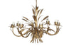 Large Mid-Century French, Hollywood Regency style, gilt tole wheat sheaf chandelier with eight curved leaved branches bulb holders