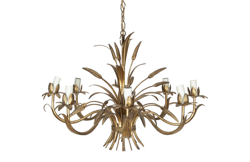 Large Mid-Century French, Hollywood Regency style, gilt tole wheat sheaf chandelier with eight curved leaved branches bulb holders