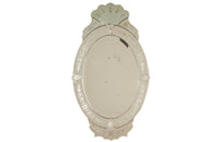 An elegant large Mid-Century Italian Venetian style oval mirror.