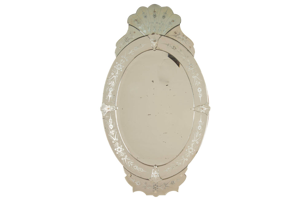 An elegant large Mid-Century Italian Venetian style oval mirror.