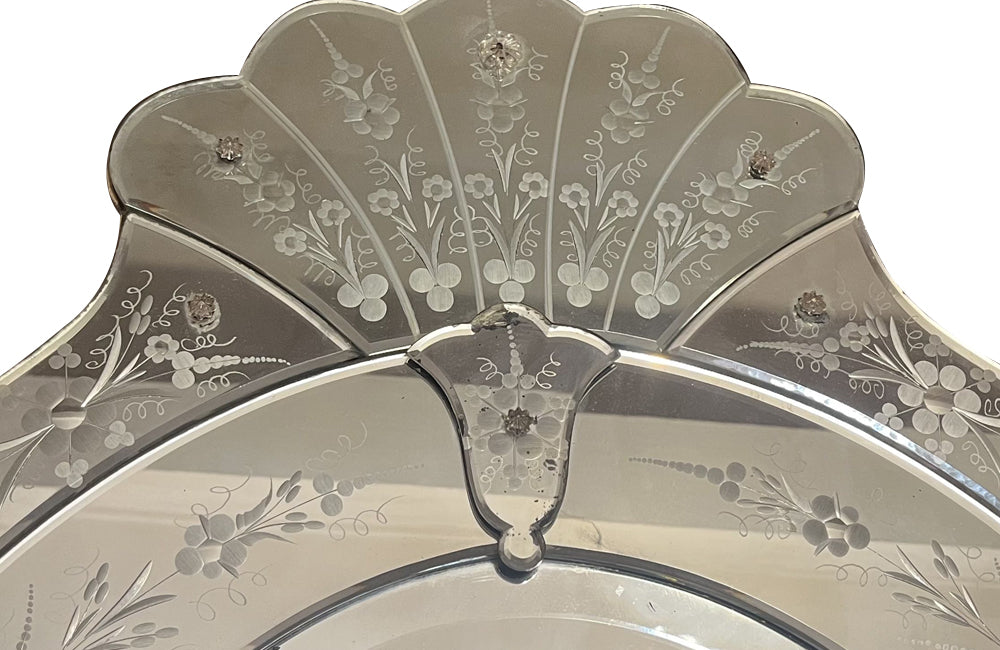 An elegant large Mid-Century Italian Venetian style oval mirror.