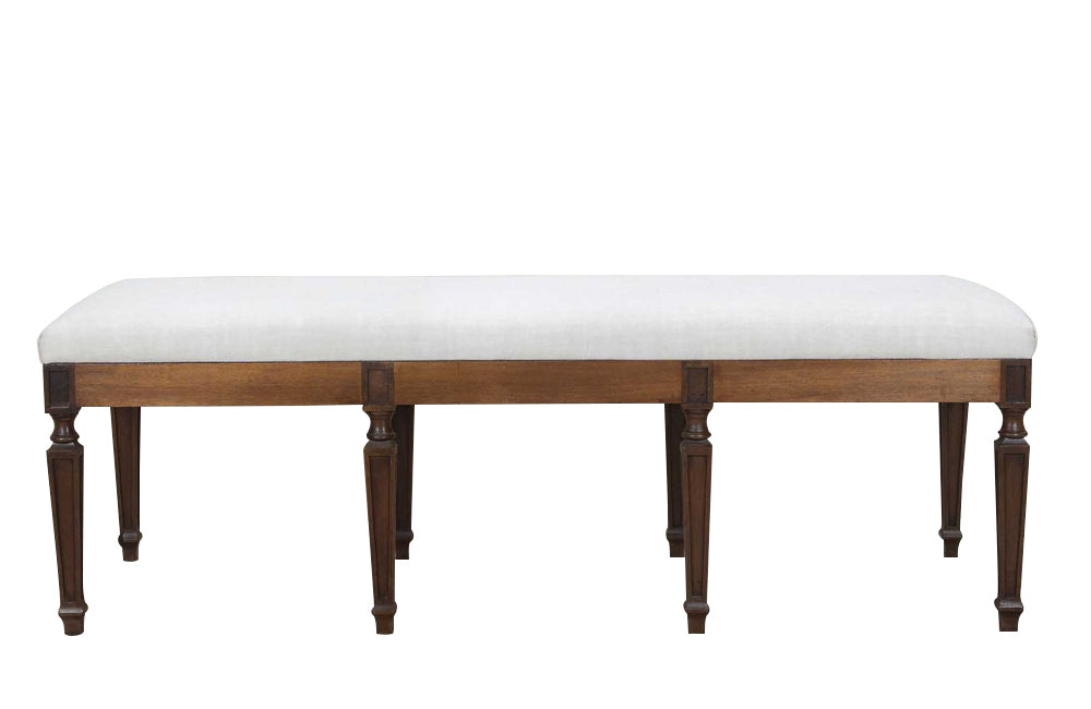 Large early 20th Century French walnut banquette in the Neo-Classical style.